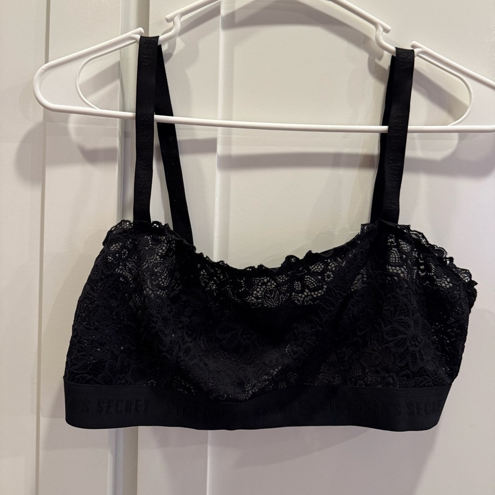 Victoria’s Secret black lace bra,‎ the band has Victoria’s Secret written on it.